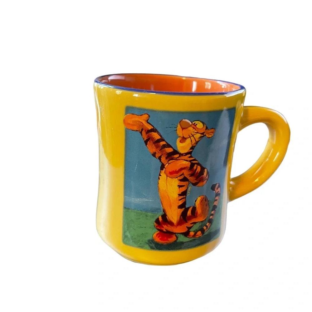 The Disney Store Tigger Mug in Yellow & Orange “Base‎ on Winnie the Pool”